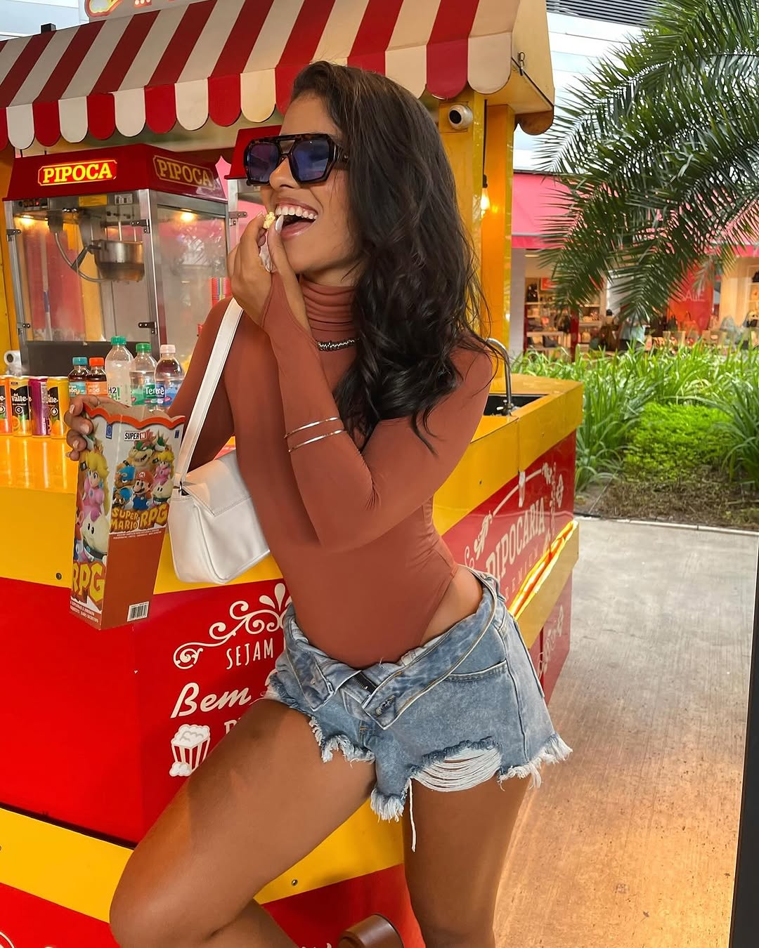 Microshorts Have Officially Entered Their Transitional Era—46 Outfits to Wear From Summer Into Fall
